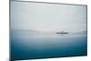 A Small Ferry on Blue Water-Clive Nolan-Mounted Photographic Print