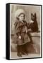 A Small Girl in a Sailor Suit Poses with Her Schipperke-null-Framed Stretched Canvas