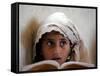 A Small Girl Takes Lessons at the Nangalam High School in Nangalam, Eastern Afghanistan-null-Framed Stretched Canvas