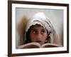 A Small Girl Takes Lessons at the Nangalam High School in Nangalam, Eastern Afghanistan-null-Framed Photographic Print