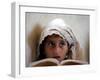 A Small Girl Takes Lessons at the Nangalam High School in Nangalam, Eastern Afghanistan-null-Framed Photographic Print