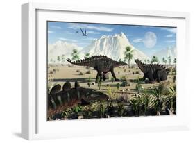 A Small Group of Stegosaurid Miragaia Dinosaurs-null-Framed Art Print