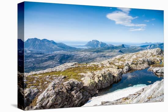 A Small Lake with Snow and View towards Mountains and the Sea in Northern Norway-Lamarinx-Stretched Canvas