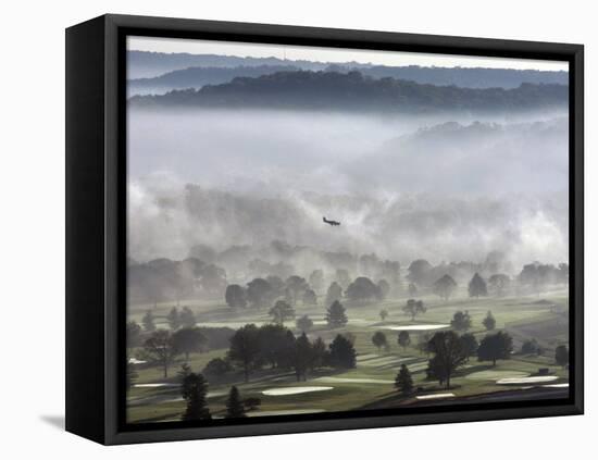 A Small Plane Descends Over Fog Covered Reeves Municipal Golf Course as It Lands at Lunken Airport-null-Framed Stretched Canvas