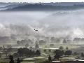 #39 A Small Plane Descends Over Fog Covered Reeves Municipal Golf Course