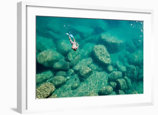 A Snorkeler Explores the Scenic Rock Formations of the Islands of Lake Malawi, Malawi, Africa.-SAPhotog-Framed Photographic Print