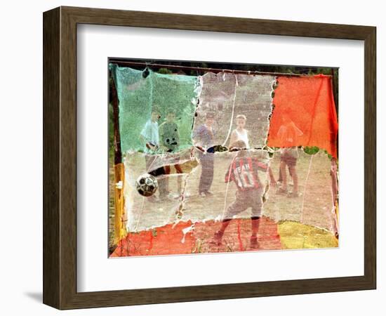 A Soccer Ball Slips Through an Opening of a Makeshift Goal During a Game Played by Bosnian Children-null-Framed Photographic Print