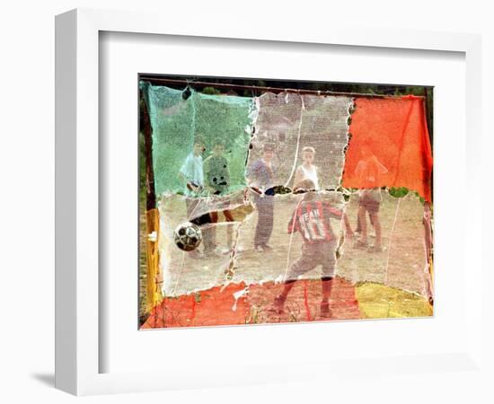 A Soccer Ball Slips Through an Opening of a Makeshift Goal During a Game Played by Bosnian Children-null-Framed Photographic Print