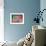 A Soccer Ball Slips Through an Opening of a Makeshift Goal-null-Framed Photographic Print displayed on a wall