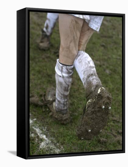 A Soccer Player's Muddy Cleats-null-Framed Stretched Canvas