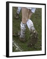 A Soccer Player's Muddy Cleats-null-Framed Photographic Print