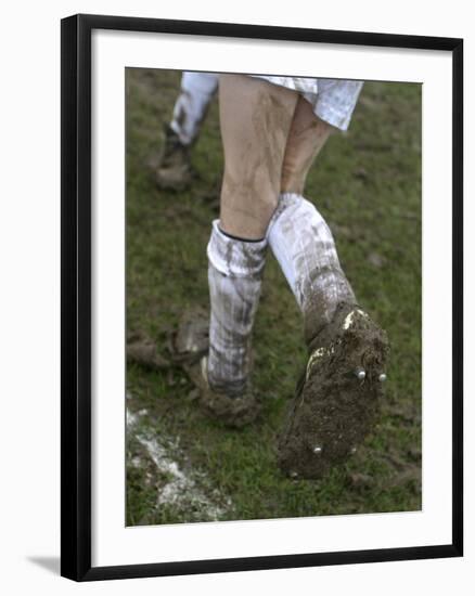 A Soccer Player's Muddy Cleats-null-Framed Photographic Print