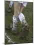 A Soccer Player's Muddy Cleats-null-Mounted Photographic Print