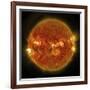 A Solar Flare Erupting on the Left Side of the Sun-null-Framed Art Print