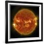 A Solar Flare Erupting on the Left Side of the Sun-null-Framed Art Print