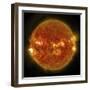 A Solar Flare Erupting on the Left Side of the Sun-null-Framed Art Print