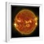 A Solar Flare Erupting on the Left Side of the Sun-null-Framed Art Print