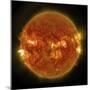 A Solar Flare Erupting on the Left Side of the Sun-null-Mounted Art Print