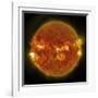 A Solar Flare Erupting on the Left Side of the Sun-null-Framed Art Print