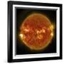 A Solar Flare Erupting on the Left Side of the Sun-null-Framed Art Print