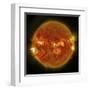 A Solar Flare Erupting on the Left Side of the Sun-null-Framed Art Print