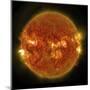 A Solar Flare Erupting on the Left Side of the Sun-null-Mounted Art Print