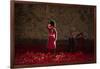 A soldier salutes in the midst of poppies at the Tower of London-Associated Newspapers-Framed Photo