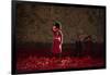 A soldier salutes in the midst of poppies at the Tower of London-Associated Newspapers-Framed Photo