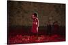 A soldier salutes in the midst of poppies at the Tower of London-Associated Newspapers-Stretched Canvas