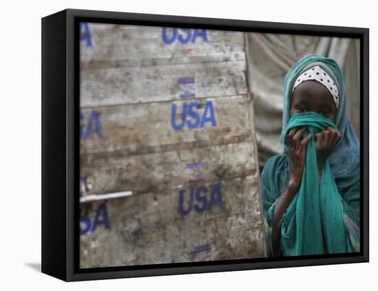 A Somali Child Covers Her Face at Dadaab Refugee Camp in Northern Kenya Monday, August 7 2006-Karel Prinsloo-Framed Stretched Canvas