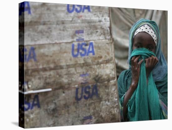 A Somali Child Covers Her Face at Dadaab Refugee Camp in Northern Kenya Monday, August 7 2006-Karel Prinsloo-Stretched Canvas