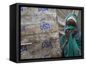 A Somali Child Covers Her Face at Dadaab Refugee Camp in Northern Kenya Monday, August 7 2006-Karel Prinsloo-Framed Stretched Canvas