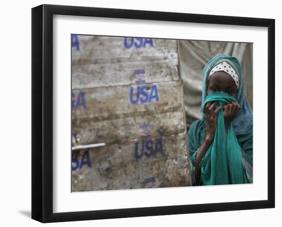 A Somali Child Covers Her Face at Dadaab Refugee Camp in Northern Kenya Monday, August 7 2006-Karel Prinsloo-Framed Photographic Print