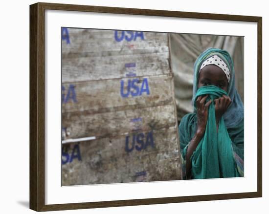 A Somali Child Covers Her Face at Dadaab Refugee Camp in Northern Kenya Monday, August 7 2006-Karel Prinsloo-Framed Photographic Print