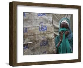 A Somali Child Covers Her Face at Dadaab Refugee Camp in Northern Kenya Monday, August 7 2006-Karel Prinsloo-Framed Photographic Print