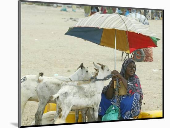 A Somaliland Woman Waits for Customers, in Hargeisa, Somalia September 27, 2006-Sayyid Azim-Mounted Photographic Print