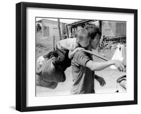 A South Vietnamese Father Carries His Son and a Bag of Household Possessions-null-Framed Premium Photographic Print