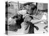 A South Vietnamese Father Carries His Son and a Bag of Household Possessions-null-Stretched Canvas