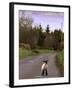 A Spring Lamb Walks in the Scenic Glens of Antrim in Cushendall, Northern Ireland-null-Framed Photographic Print