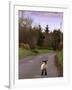 A Spring Lamb Walks in the Scenic Glens of Antrim in Cushendall, Northern Ireland-null-Framed Photographic Print