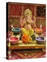 A Statue of a Mythological Elephant God -Ganesha, Surrounded by Traditional Divali Lamps-satel-Stretched Canvas