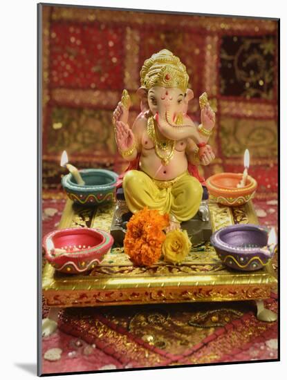 A Statue of a Mythological Elephant God -Ganesha, Surrounded by Traditional Divali Lamps-satel-Mounted Photographic Print