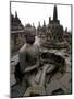 A Statue of Buddha Sits on a Terrace-Dita Alangkara-Mounted Photographic Print
