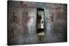 A Statue Through a Window in a Bas Relief Covered Wall in the Tomb of Ti-Alex Saberi-Stretched Canvas