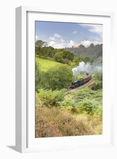 A steam locomotive approaching Goathland from Grosmont in September 2016, North Yorkshire, England-John Potter-Framed Photographic Print