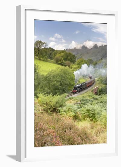 A steam locomotive approaching Goathland from Grosmont in September 2016, North Yorkshire, England-John Potter-Framed Photographic Print