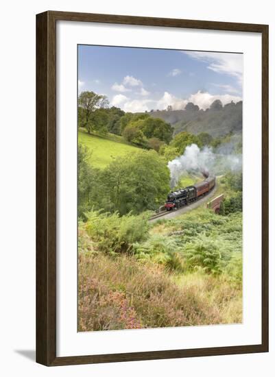 A steam locomotive approaching Goathland from Grosmont in September 2016, North Yorkshire, England-John Potter-Framed Photographic Print