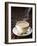 A Steaming Cup of Coffee on Coffee Beans-Peter Sapper-Framed Photographic Print