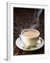 A Steaming Cup of Coffee on Coffee Beans-Peter Sapper-Framed Photographic Print