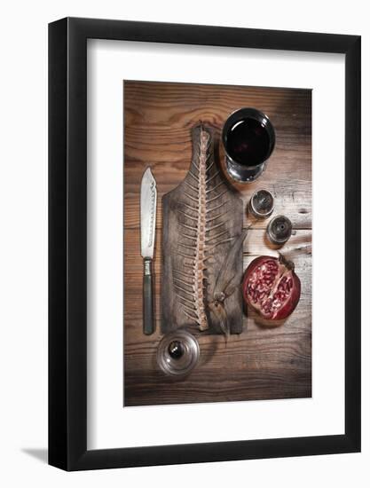 A Still Life Featuring a Fish Skeleton, Pomegranate and Red Wine-Komar-Framed Photographic Print